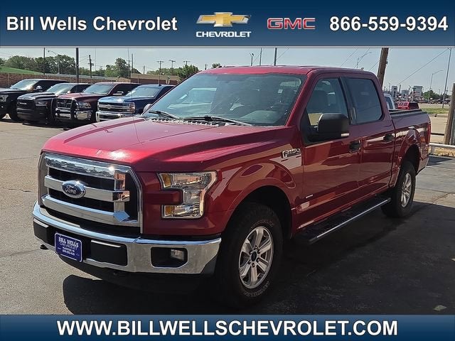 2015 Ford F-150 XLT in Maroon — front three-quarter view