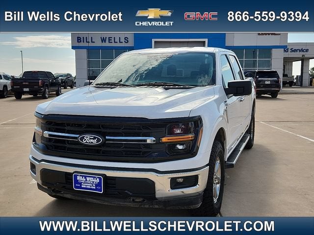 2025 Ford F-150 XLT in White — front three-quarter view