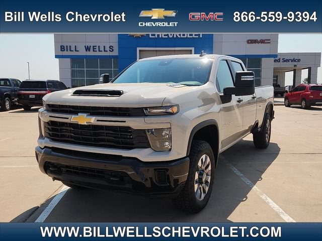 2026 Chevrolet Silverado 2500 HD Custom in White Sands — front three-quarter view