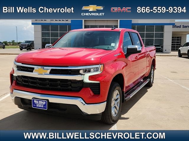 2026 Chevrolet Silverado 1500 LT in Red Hot — front three-quarter view