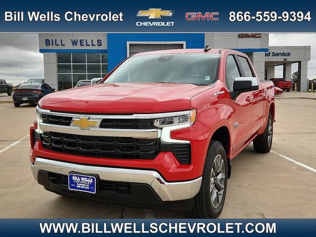 2026 Chevrolet Silverado 1500 LT in Red Hot — front three-quarter view